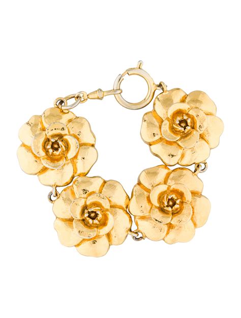 chanel camelia pendente|Chanel camellia bracelet.